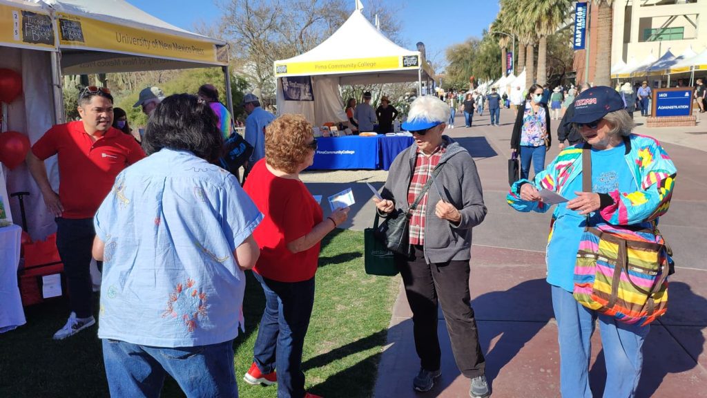 A book fair booth with the name "Readers Magnet" displayed.