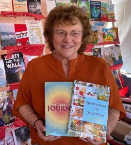 Eleanor Gaccetta holding her two books