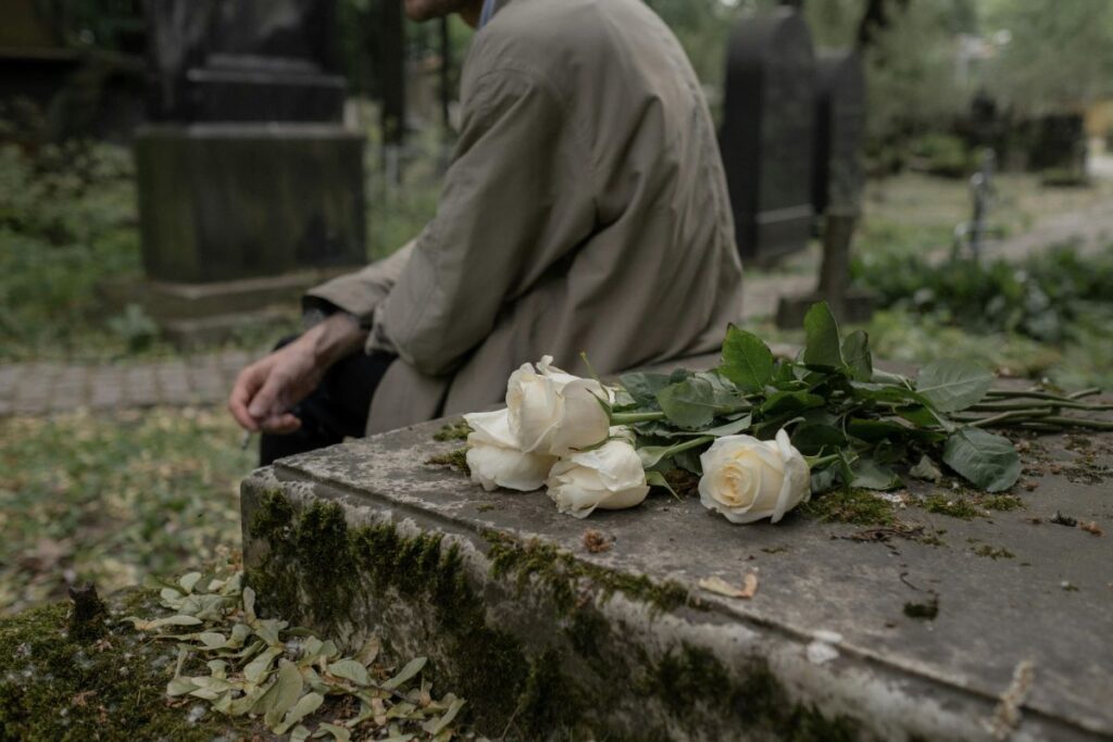 Flowers on grace depicting grief after sudden loss