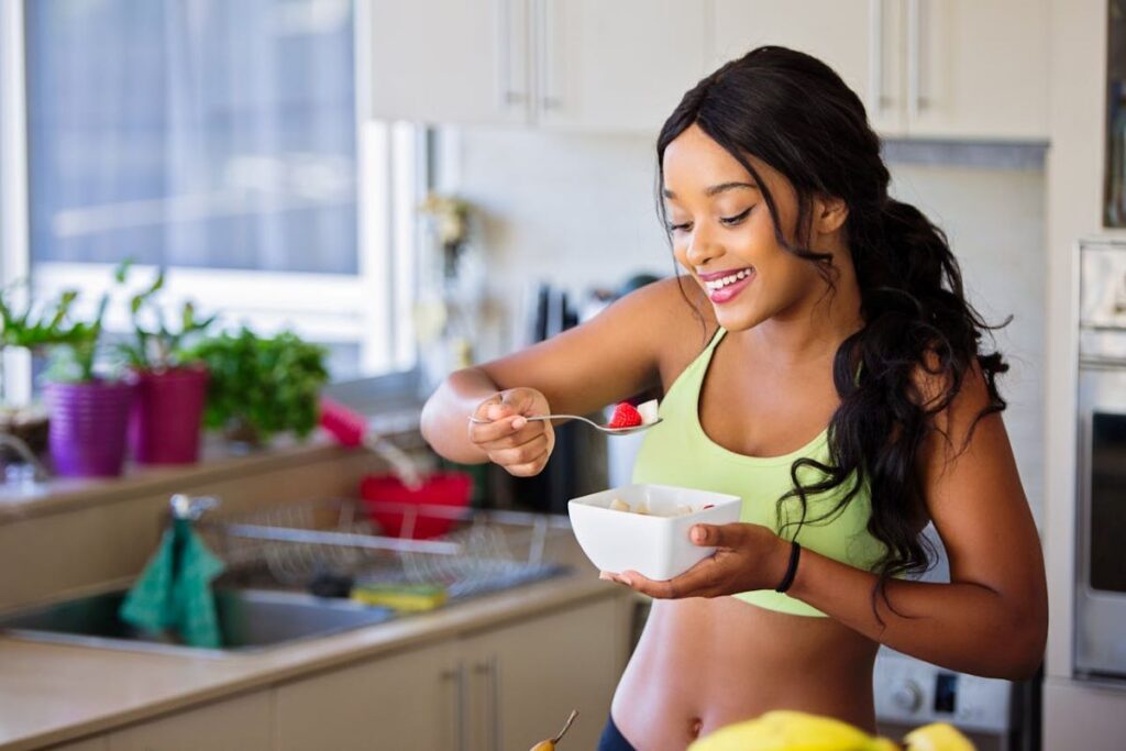 a woman eating mindfully, showcasing a guide to mindful eating
