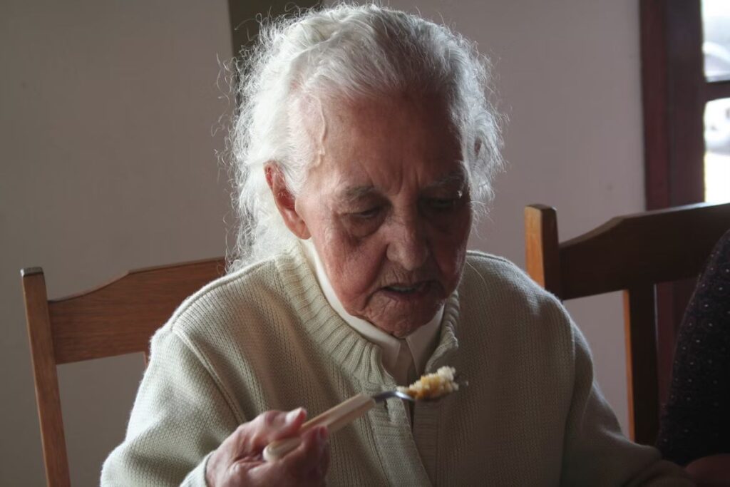 Elderly Feeding Herself