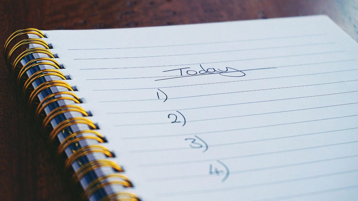 A notebook with a morning checklist for caregivers.