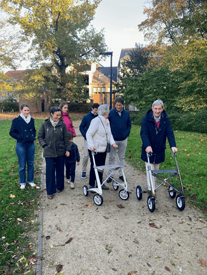 A group of elderly ladies walking together.