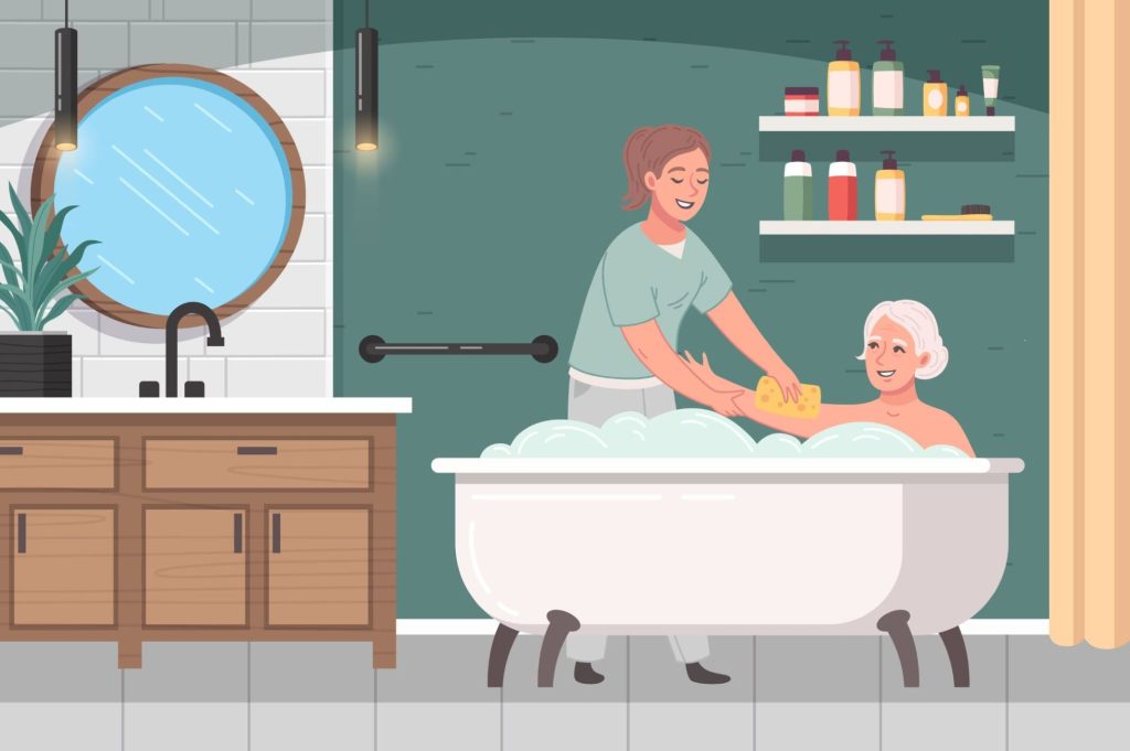 A caretaker bathing an old woman.