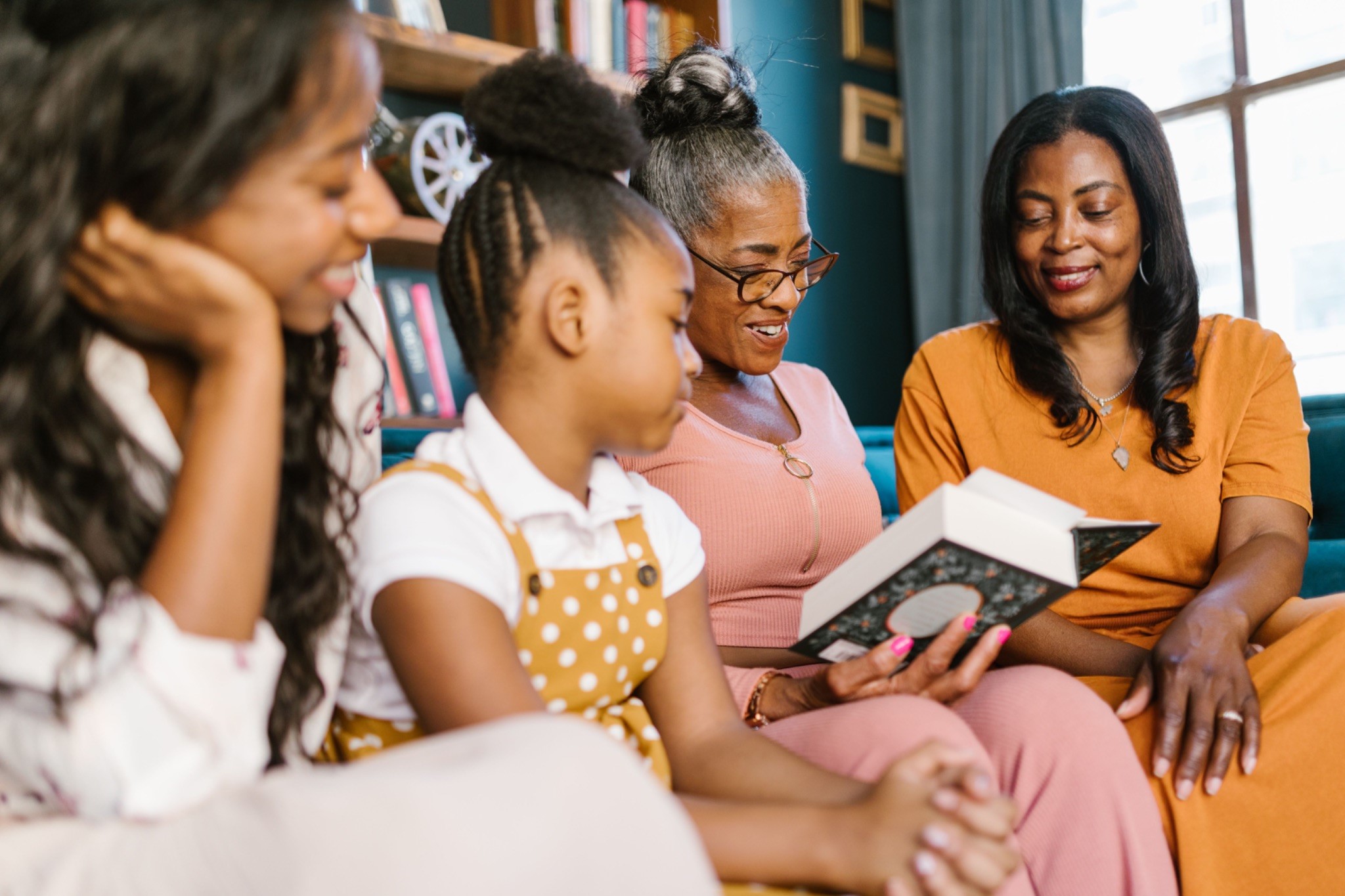 A family reading together, reflecting family conversations inspired by caregiving decision making books.
