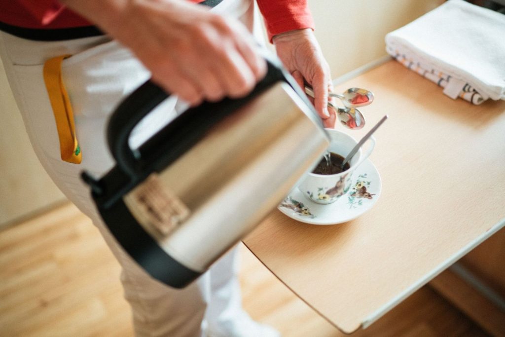 Someone preparing tea.