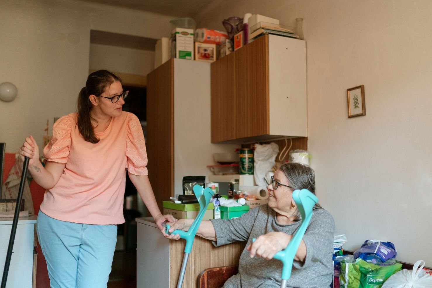 A woman taking care of her mother.